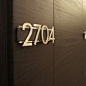 hotel metal signage on stone wall - Google Search: 