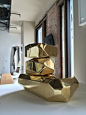 “Microrocksbrass,” a mirror-polished brass sculpture by Arik Levy. It’s one of the pieces at Please Do Not Enter, a carefully curated design boutique for sophisticated men in downtown L.A.