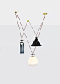 Shape Up 3-Piece Chandelier : MATERIALS: Glass, steel, brass, aluminum
FINISHES:
Metal Shade: Blackened steel, brushed brass, brushed copper
Cylinder: Midnight blue
Globe: Gray fog
Cord: Currant, black
DIMENSIONS: Overall dimensions variable.
Globe: L 11i