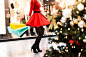 Download Woman in Red Dress Enjoying Christmas Shopping FREE Stock Photo