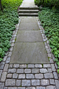 paving and pachysandra