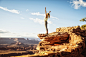 Hispanic woman practicing yoga on rock formation by Gable Denims on 500px