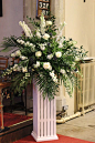 church wedding flower arrangment | ivory and blue pedestal arrangement: 