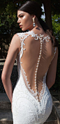 Stunning illusion back wedding dress with exquisite pearl detailing: