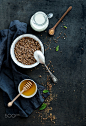 Rustic healthy breakfast set. Cooked buckwheat groats with milk and honey on dark grunge backdrop by Anna Ivanova on 500px