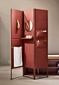 SHADE is a folding screen offering an upscale solution to maximize the bathroom space. It is possible to accessorize it with shelves, leather loop towel holders, mirrors, and object holder pockets. Here displayed in the exquisite medium grain red leather.