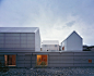 House in Yamasaki with rooftop sheds by Tato Architects