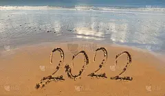 2022年在沙滩上手写以大海为背景
