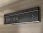   Number directories in painted acrylic and brushed brass.  