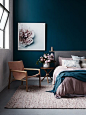 Gorgeous dark blue walls and blush accents: 
