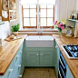 .Love the sink and butcher block countertops: