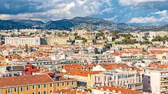 Nice, aerial view of colorful houses on the hill, on the French Riviera, Cote d’Azur