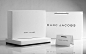 March Jacobs luxury retail packaging in both white and black retail boxes and retail shopping bags.