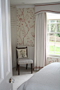 Sweet country bedroom with contrast detail on the ivory curtains and pelmet