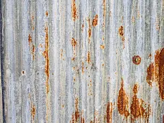 旧生锈的金属板屋顶纹理背景