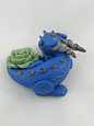 Handmade Polymer Clay Dragon Sleeping with a Rose, Blue Sparkles : This little dragon is 2.5 long and 1 high.