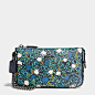 Nolita Wristlet 19 in Yankee Floral Print Coated Canvas : Shop The COACH Nolita Wristlet 19 In Yankee Floral Print Coated Canvas. Enjoy Complimentary Shipping & Returns! Find Designer Bags, Wallets, Shoes & More At COACH.com!