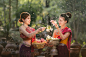 laos girls splashing water during festival Songkran festival