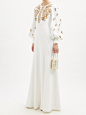 Crystal-embellished zipped crepe gown | Andrew Gn : Andrew Gn’s penchant for couture-level detailing is demonstrated through this white gown that's embroidered and embellished with crystals around the zipped bodice and bishop sleeves.  