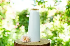 shampoo or shower gel and flower rose on wooden natural background, copy space . organic cosmeticsshampoo or shower gel and flower rose on wooden natural background, copy space . organic cosmetics