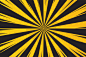 Yellow and black rays background for warning of danger. Premium Vector