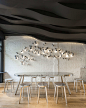 Fumi Coffee : Celebrating coffee’s intangible pleasures, Alberto Caiola translates coffee’s aromatic vapors into a sculptural ceiling that is the centrepiece for this café...