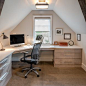 Inspiration for a rustic built-in desk carpeted study room remodel in Philadelphia with white walls