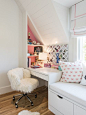 Transitional girl medium tone wood floor kids' room photo in Louisville with pink walls