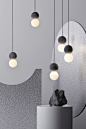 Origo by studio davidpompa, volcanic rock and glass. Geometry in its purest form. Origo embodies opposite essences mirroring volcanic rock and an opal glass diffuser. The volcanic rock sphere has been formed by a handmade process, enhancing its aesthetic 