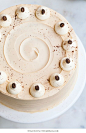 Caramel Cappuccino Cake - espresso cake paired with caramel buttercream frosting, topped with whole coffee beans and a sprinkle of cocoa powder | by Tessa Huff for TheCakeBlog.com: 