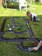 The kids will have  fun with this Tyre Race Car Track and you can make it easily. Check out the Car Garage too!