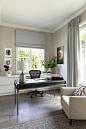 Study room - mid-sized contemporary freestanding desk dark wood floor and brown floor study room idea in Los Angeles with gray walls and no fireplace