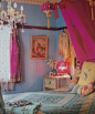 Whimsical Romantic Gypsy / Boho bedroom. Soft romantic blues, patchwork and pops of vibrant pinks and gold.