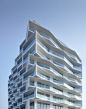 COSTALOPES, Fabrice Fouillet · Dyeji Building : The Dyeji Building is part of the Bay of Luanda Parcel 3 development scheme located at the narrowest part of the Ilha do Cabo promontory. <br/>The scheme consists of a total of 57 plots (its limits bei