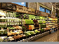 Gorgeous Whole Foods Market produce display | By 2018, Whole Foods will require the labeling of all genetically-modified foods sold in their stores.