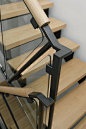 Steel, glass, and oak handrail. Hacin + Associates, Boston.: 