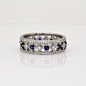 Gala Sapphire and Diamond Eternity Ring in 18k White Gold  | Blue Nile : Delicate in design, this eye-catching 18k white gold eternity ring features alternating rich blue sapphires set between a brilliant pavé diamond channels.