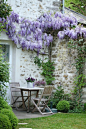 This image is too pretty to not share. @hellolovelystudio, I love this so much! #wisteria #shabbychic #stonecottage #lifestyleblogger #spring #outdoorspaces