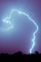 Last night we had the first thunderstorm of the year! …and I managed to capture this bolt o’ lightnin’.

Semi-interesting fact— Newspapers in the 1800′s often used terms other than “lightning” when describing it.  Their alternate terms included:  “electri