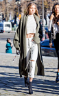 Gigi Hadid from Victoria's Secret Models Off-Duty Style  The It Girl model walks the Paris streets in her everyday uniform: a crop top, distressed jeans and oversize coat.