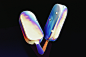 Two ice cream pops sitting on top of each other
