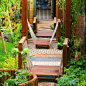 hanging bridges and textured walkways - i love the idea of having varying textures along a path and the hanging bridges are amazing!