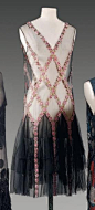 Wow - "Anonymous, haute couture, circa 1925. Dress in black tulle embroidered with sequins, beads pink patterned flowers...gold sequins and diamonds": 