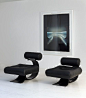 A pair of lounge chairs (1972) by Oscar Niemeyer, Brazil. / Galerie DownTown