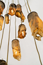 Nea Studio creates lamps from dried seaweed : Curling edges detail these hanging lamps that New York designer Nina Edwards Anker has created from dried sheets of algae.