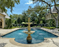 French Formal Estate : This exquisite French formal residence in Highland Park, Texas, features extensive architectural detailing and is surrounded by meticulously maintained gardens and landscape. The residence was