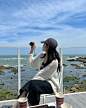 Photo by Minseo on May 06, 2024. May be an image of 1 person, ocean, coast and picnic.