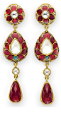 A PAIR OF DIAMOND, RUBY AND EMERALD EAR PENDANTS   Each suspending a bezel-set drop-shaped ruby, from a collet-set rose-cut diamond link, to a drop-shaped plaque centering upon a pear-shaped diamond, within a modified drop-shaped ruby and emerald surround