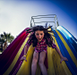 Photograph Caucasian girl playing on slide by Gable Denims on 500px