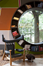 circular window with bookcase surround: 